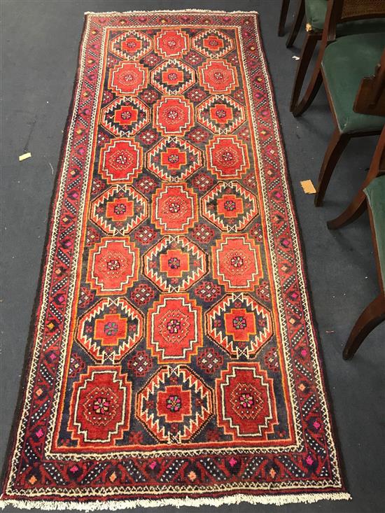 A Turkman rug 240 x 99cm